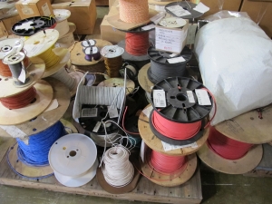 (5 PALLETS) MISC. ELECTRICAL WIRE, AND CABLE! (20+) INDIVIDUAL SPOOLS TO INCLUDE BUT NOT LIMITED TO: (1 SPOOL) CABLE, ELECTRICAL TYPE, 16 AWG SIZE, 600V RATING, COPPER MATERIAL, 3 CONDUCTOR, INSTRUMENTATION KIND. SHIELDED, CROSS-LINKED POLYETHYLENE INSULATED, RED, HYPALON (CSPE) JACKET, FIREWALL III, CABLE CODE J36, (6 SPOOLS) WIRE, ELECTRICAL TYPE, 14 AWG SIZE, 600V 90DEG C OPE RATING, RED COLOR, TEMP RATING, TINNED COPPER MATERIAL, SWITCHBOARD, SIS KIND. INSULATED, WITH HEAT, MOISTURE AND FLAME RESISTANT CROSS LINKED SYNTHETIC POLYMER CONSTRUCTION, ETC.. LOADING & HANDLING FEE $30-4077